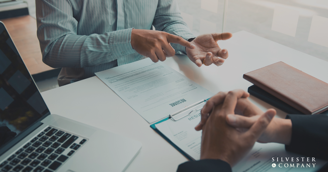 Job interview with a resume on the table.