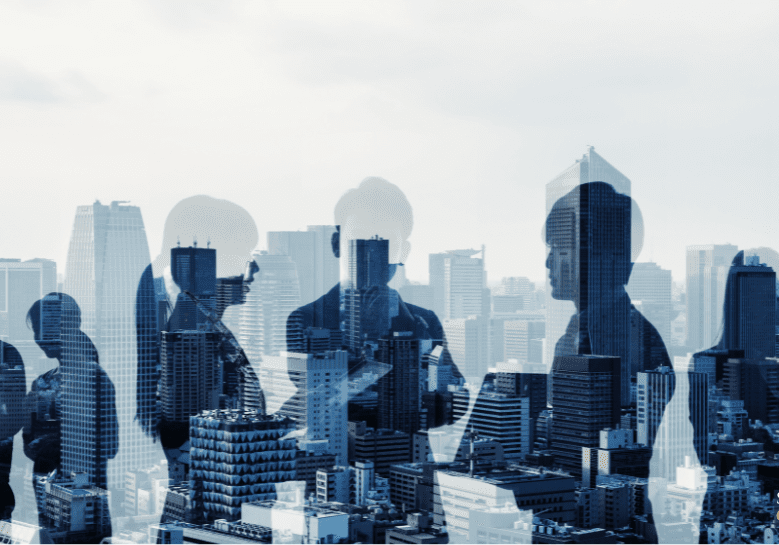 Silhouettes of people over a city skyline.